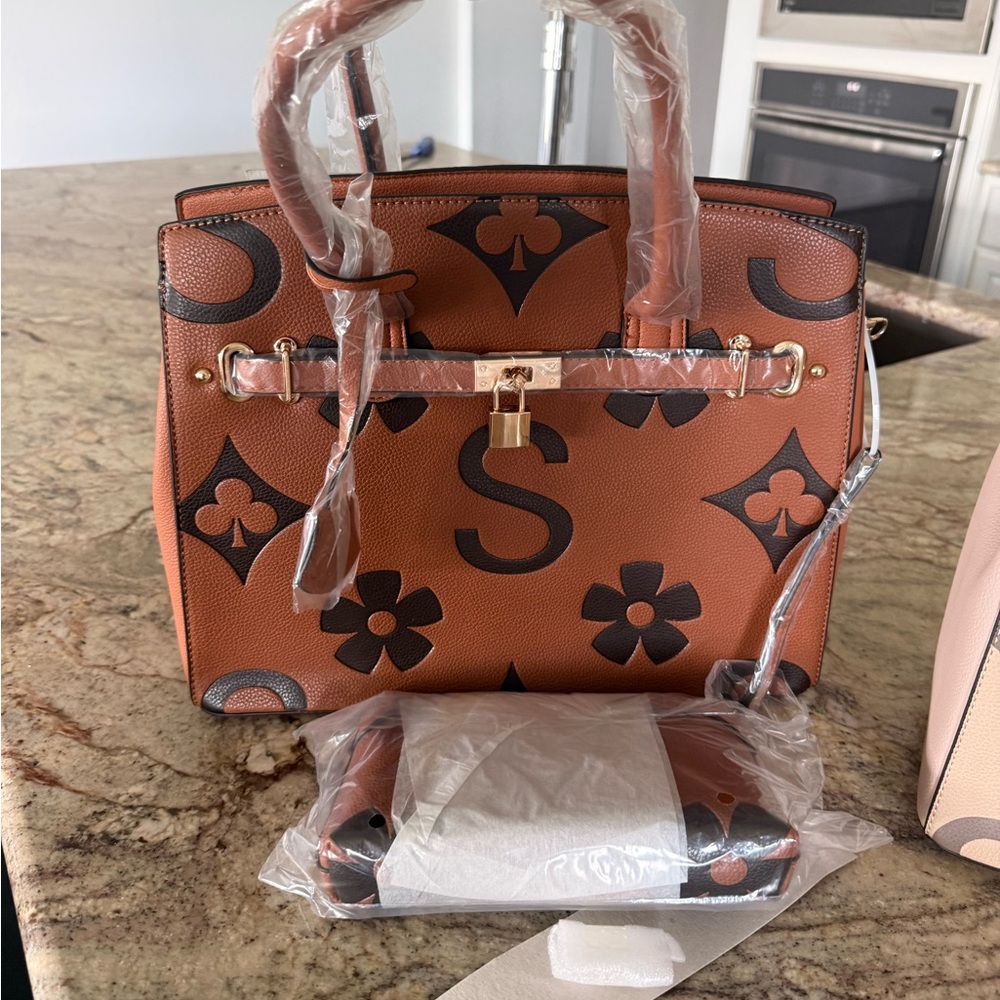 Brown or tan handbag with wallet